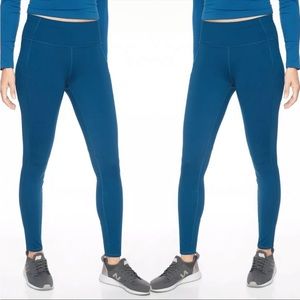 Athleta | Contender Tights peacock side pockets